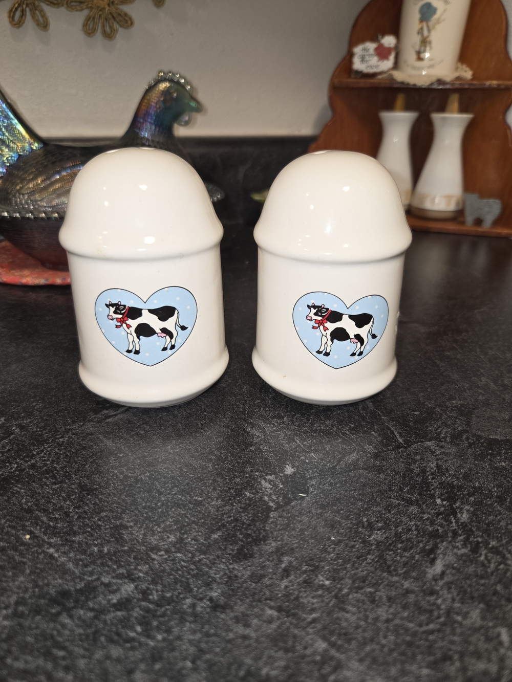 White Ceramic Salt & Pepper Shakers with Cow Heart Motif